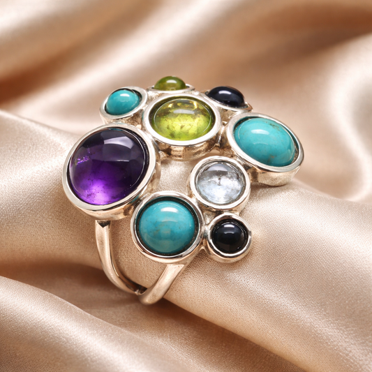 טבעת כסף מרובת אבנים