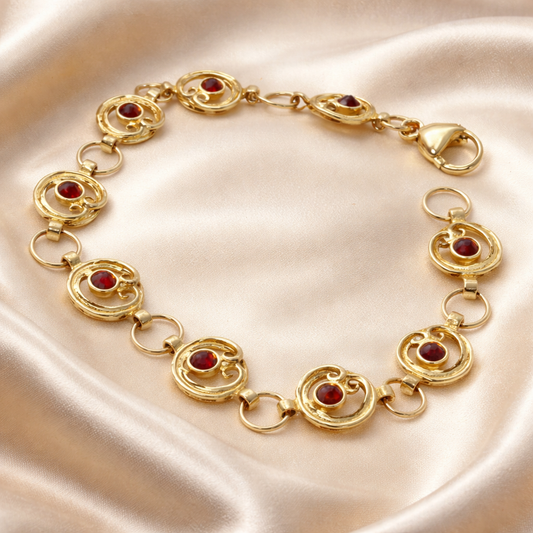 צמיד זהב 14 קראט חוליות ספירלה עם גרנטים