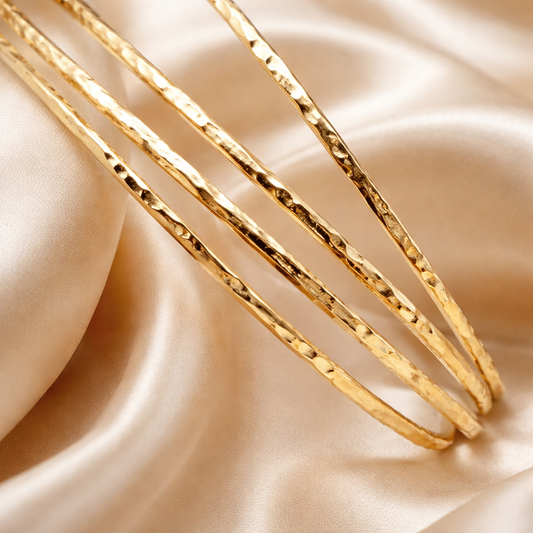 ארבעה צמידי זהב 14 קראט דקים ביחד