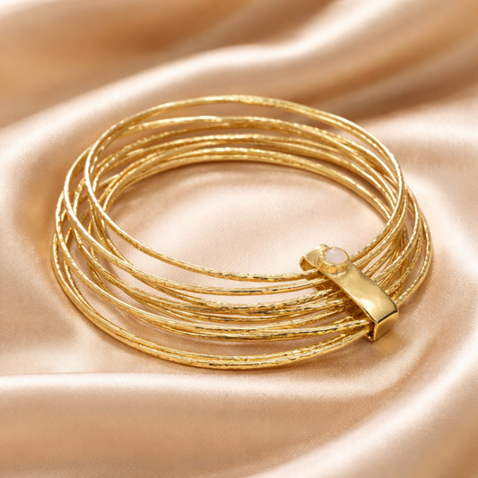 צמיד זהב מסתובב משובץ אופל