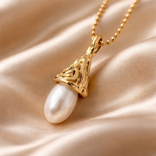 תליון זהב 14 קראט עם פנינה טיפה