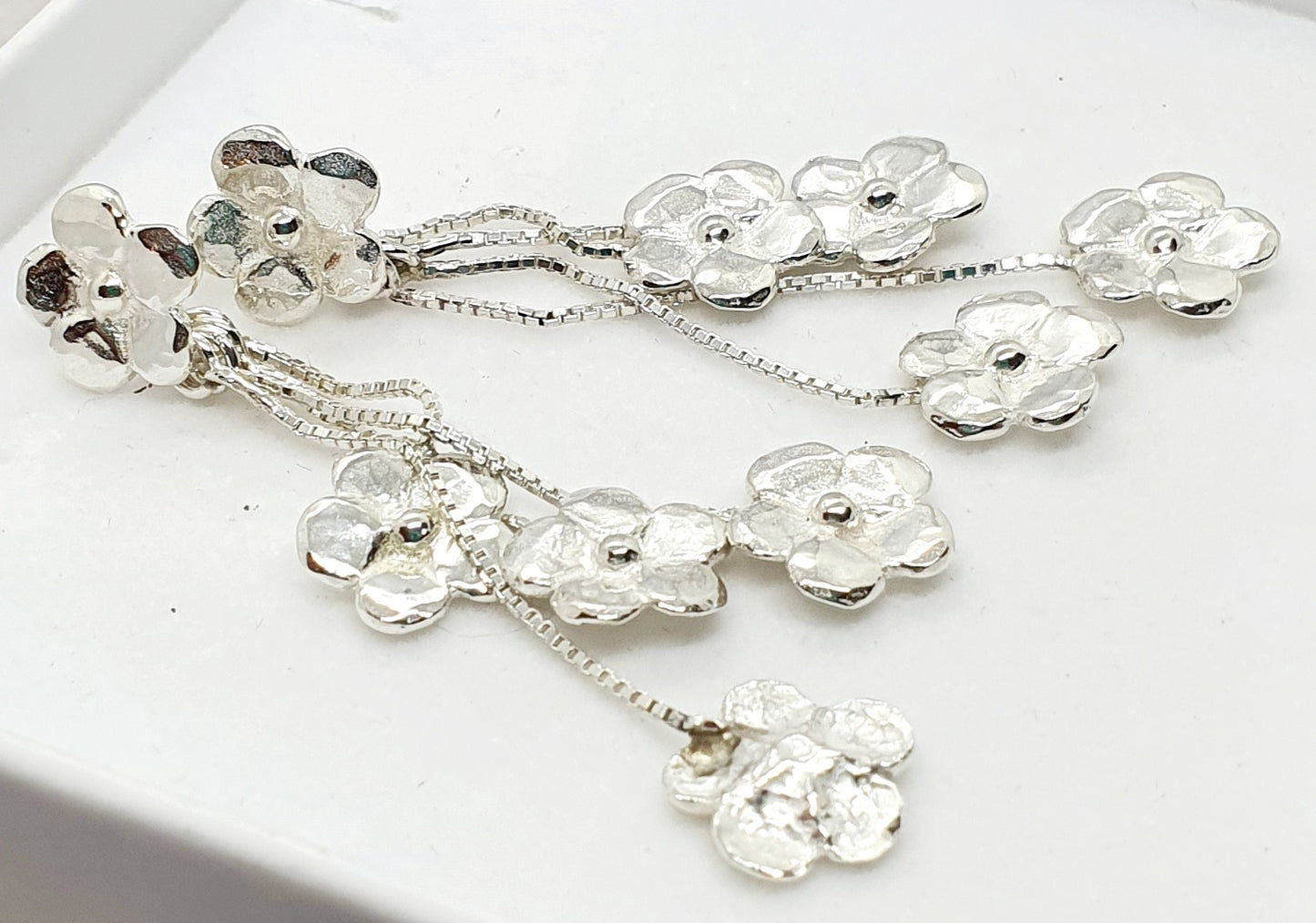 עגילי כסף פרחים קטנים